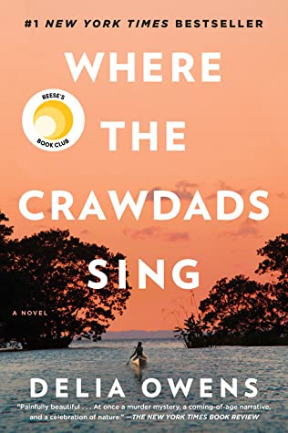 Cover of "Where the Crawdads Sing" image of the open water flanked by brushes on either end of the image.