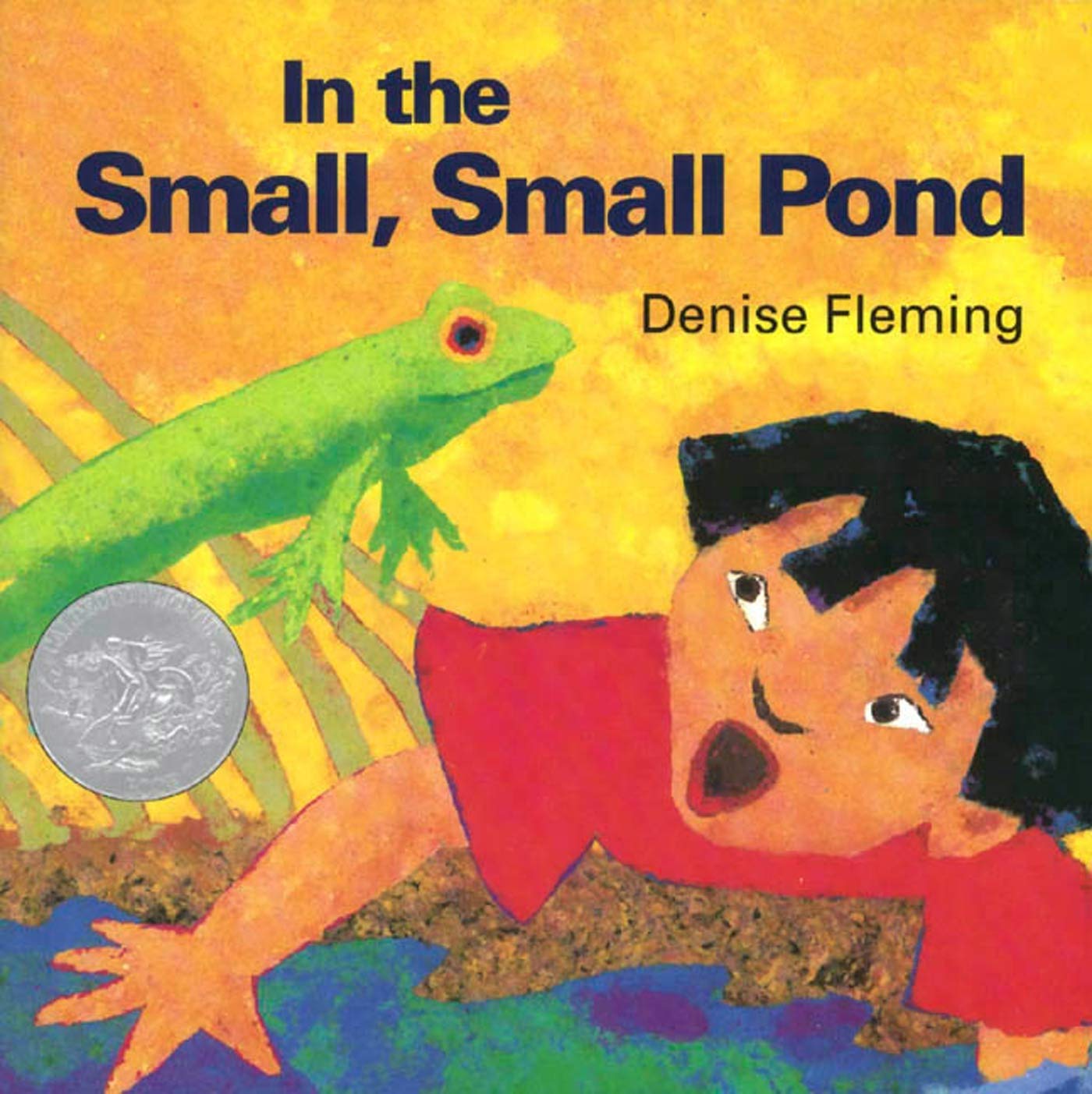 Image of the book cover "In the Small, Small Pond" by Denis FLeming. A boy is surprised by a jumping green frog.