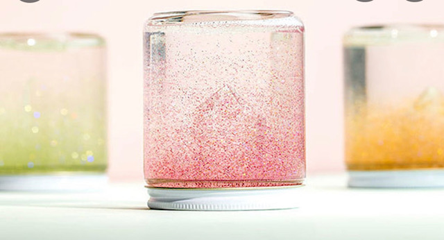 A jar of water filled with glitter.