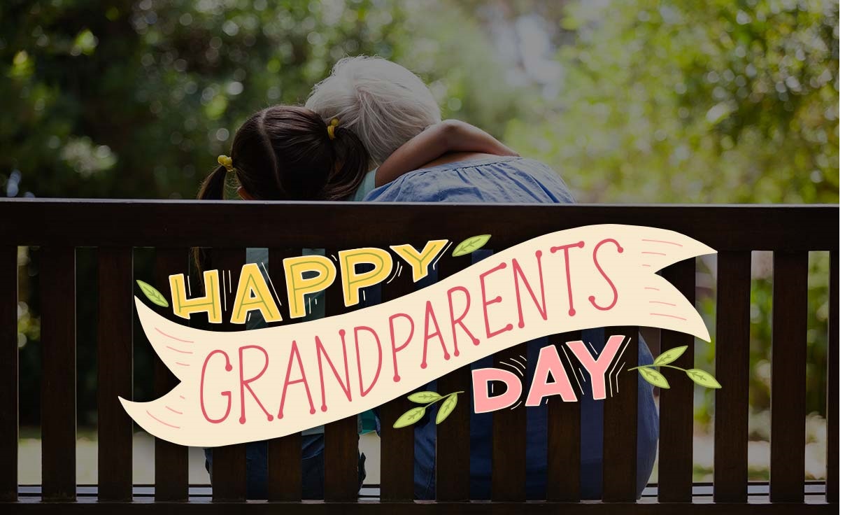 "Happy Grandparents Day" child hugging her grandparent.